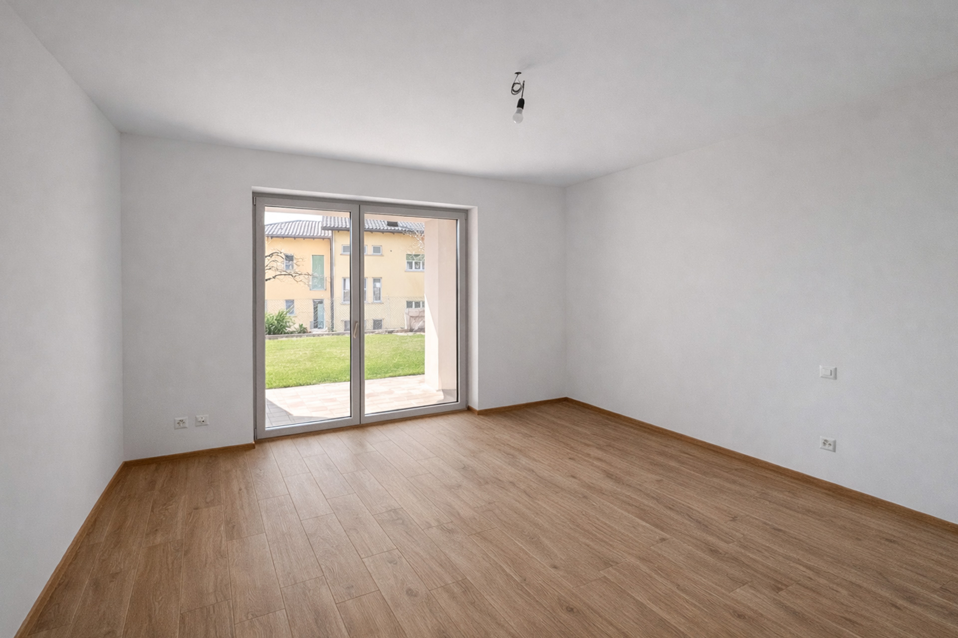 Nuovo appartamento vista lago con giardino in affitto a Massagno