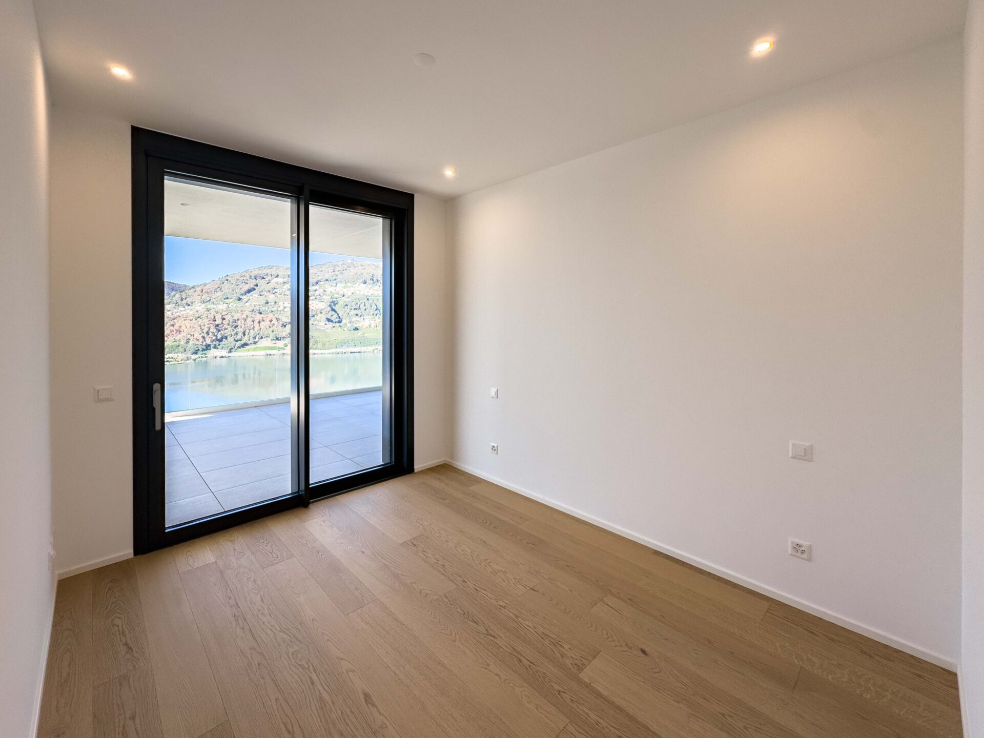 Große Wohnung mit Seeblick in Montagnola in einem neuen Gebäude zu verkaufen