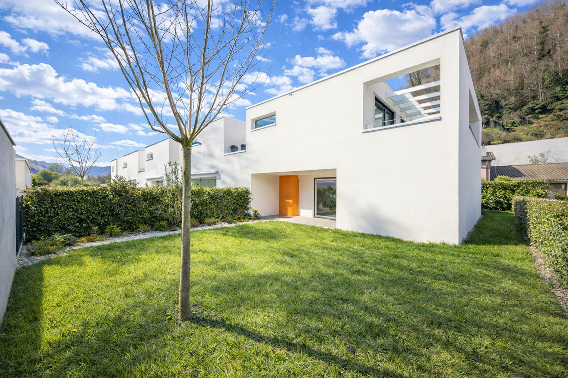 Nuova casa a schiera con giardino in vendita a Bioggio