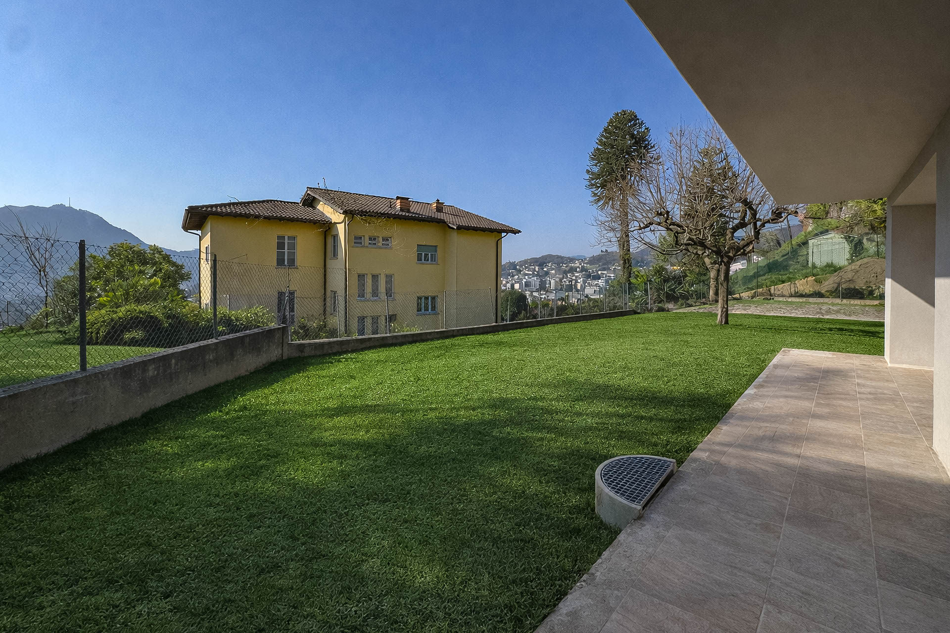 Nuovo appartamento vista lago con giardino in affitto a Massagno