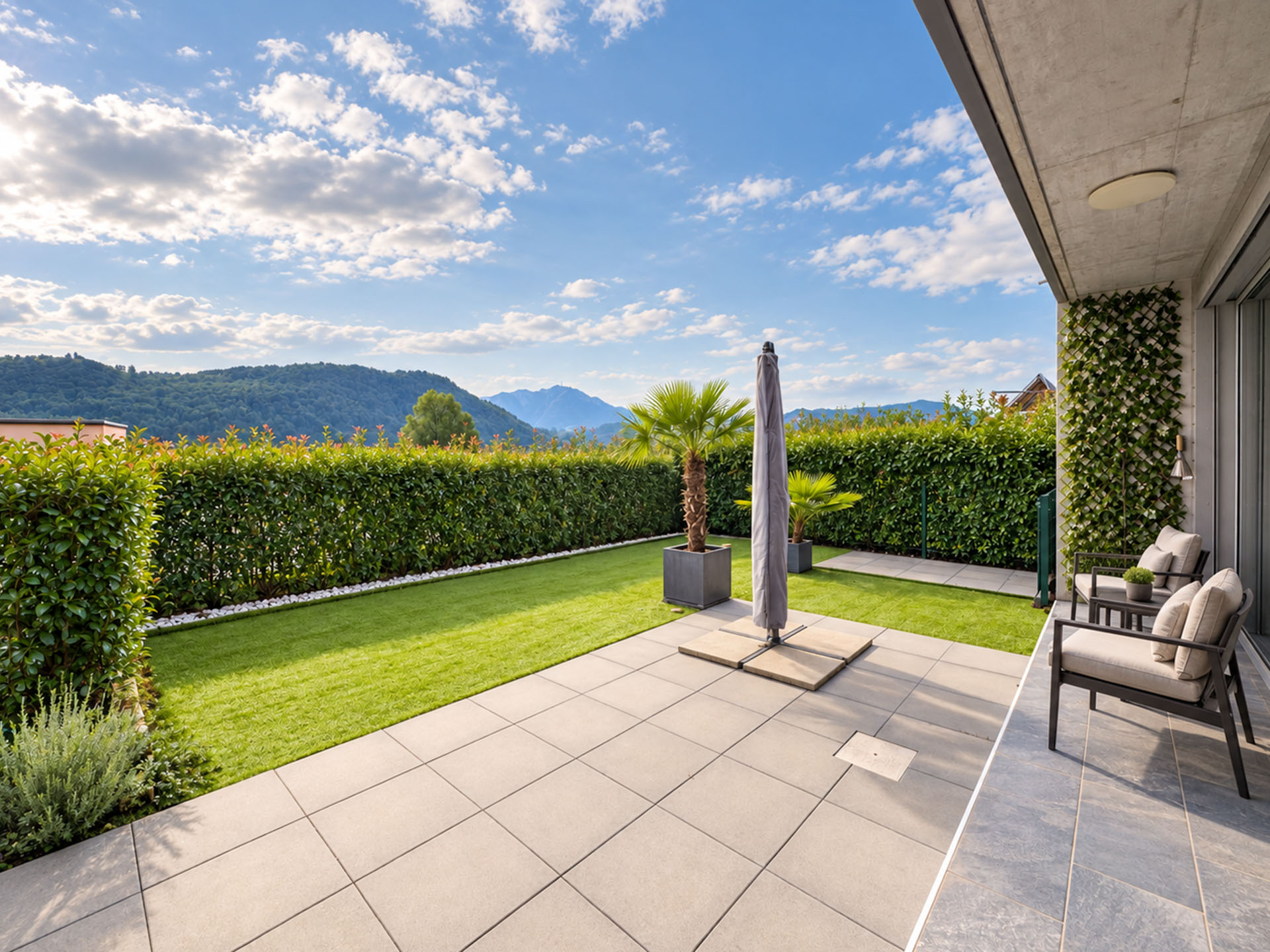 Casa a schiera con giardino e vista aperta in vendita ad Agno Casa a schiera con giardino e vista aperta in vendita ad Agno