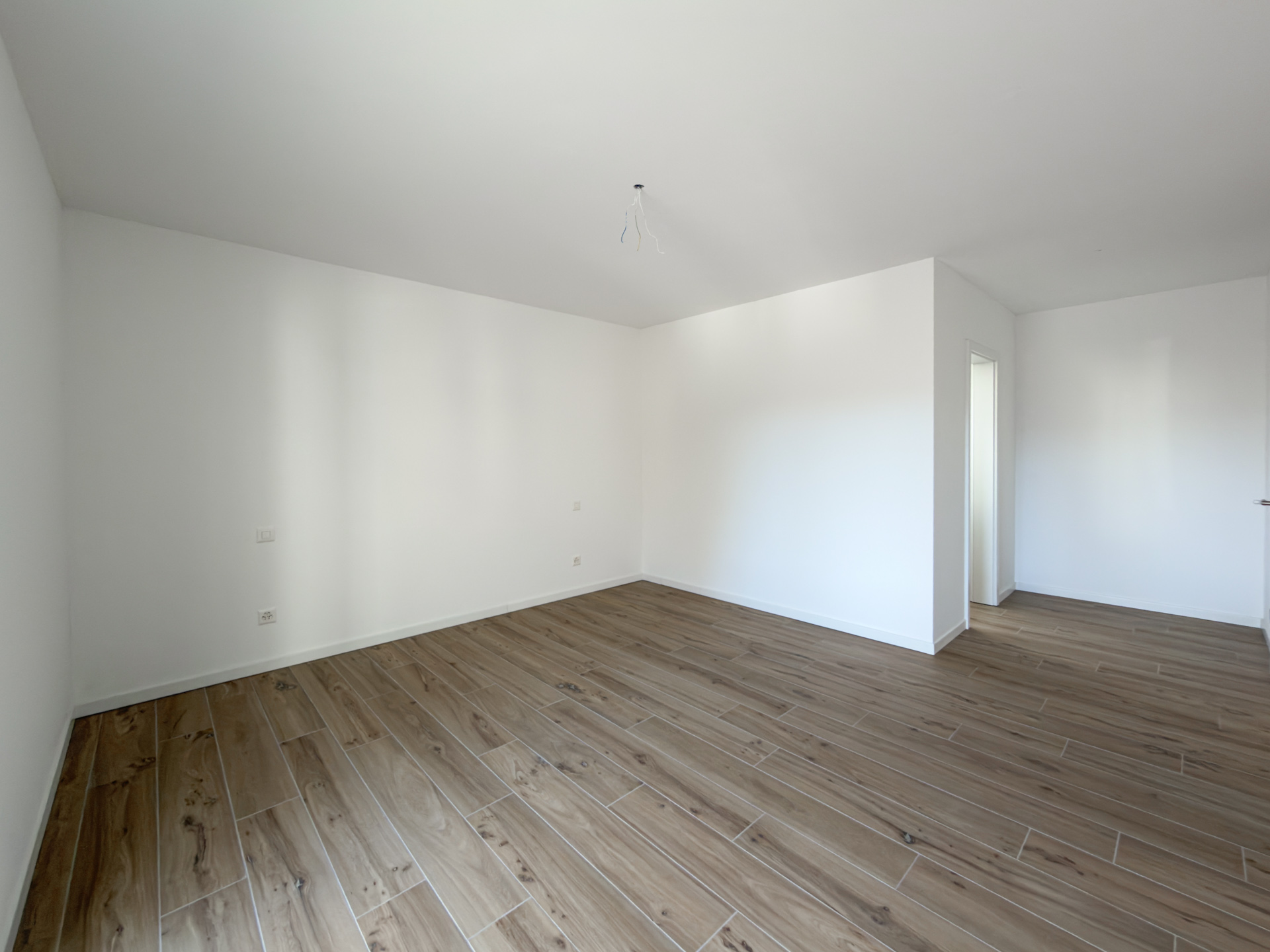 Nuova casa a schiera con giardino in vendita a Bioggio