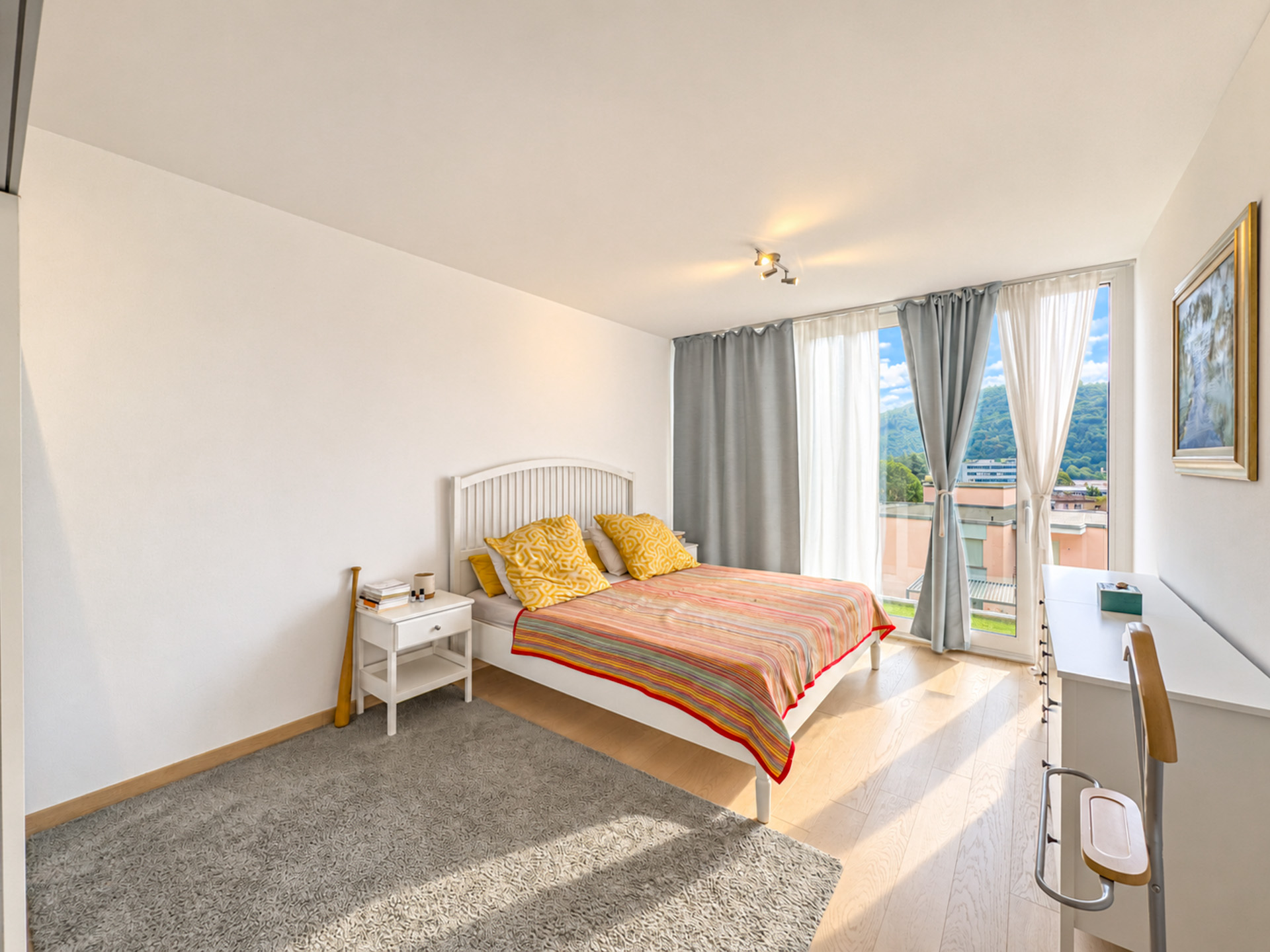 Casa a schiera con giardino e vista aperta in vendita ad Agno Casa a schiera con giardino e vista aperta in vendita ad Agno