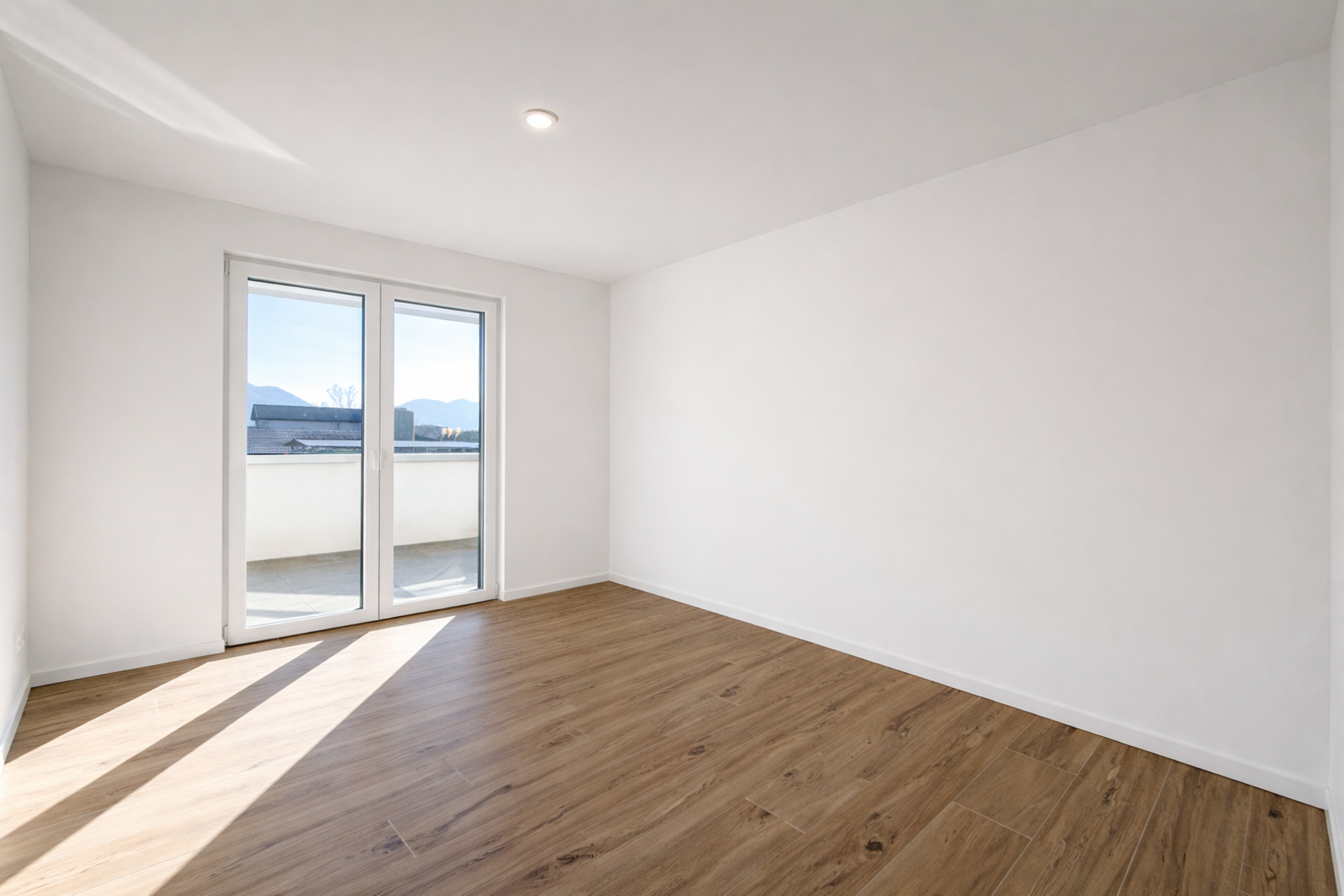 Nuova casa a schiera con giardino in vendita a Bioggio