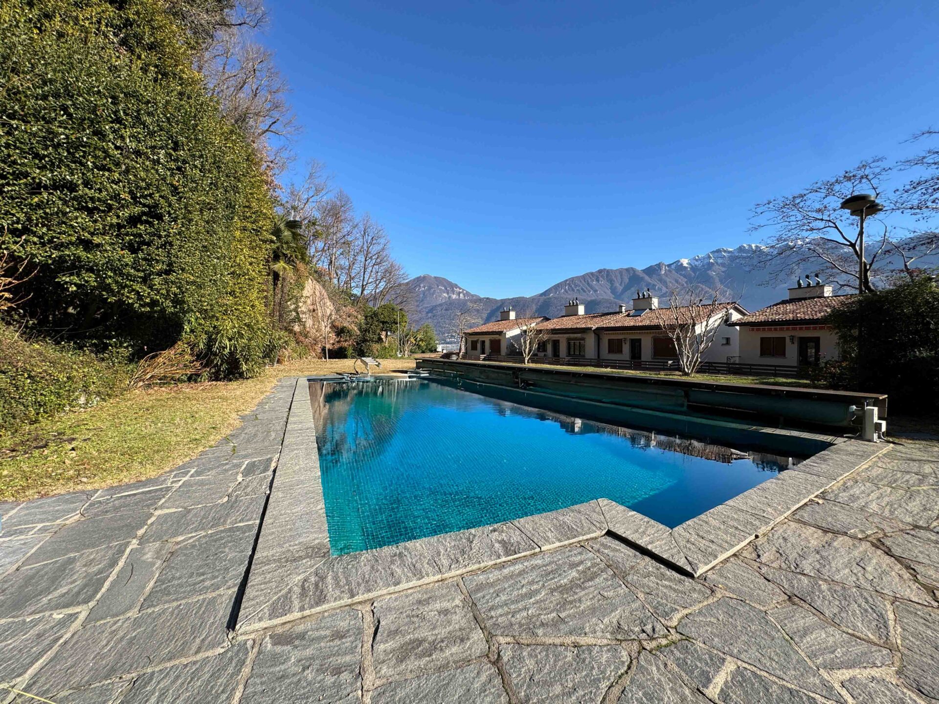 Lake view apartment with pool for sale in Vico Morcote