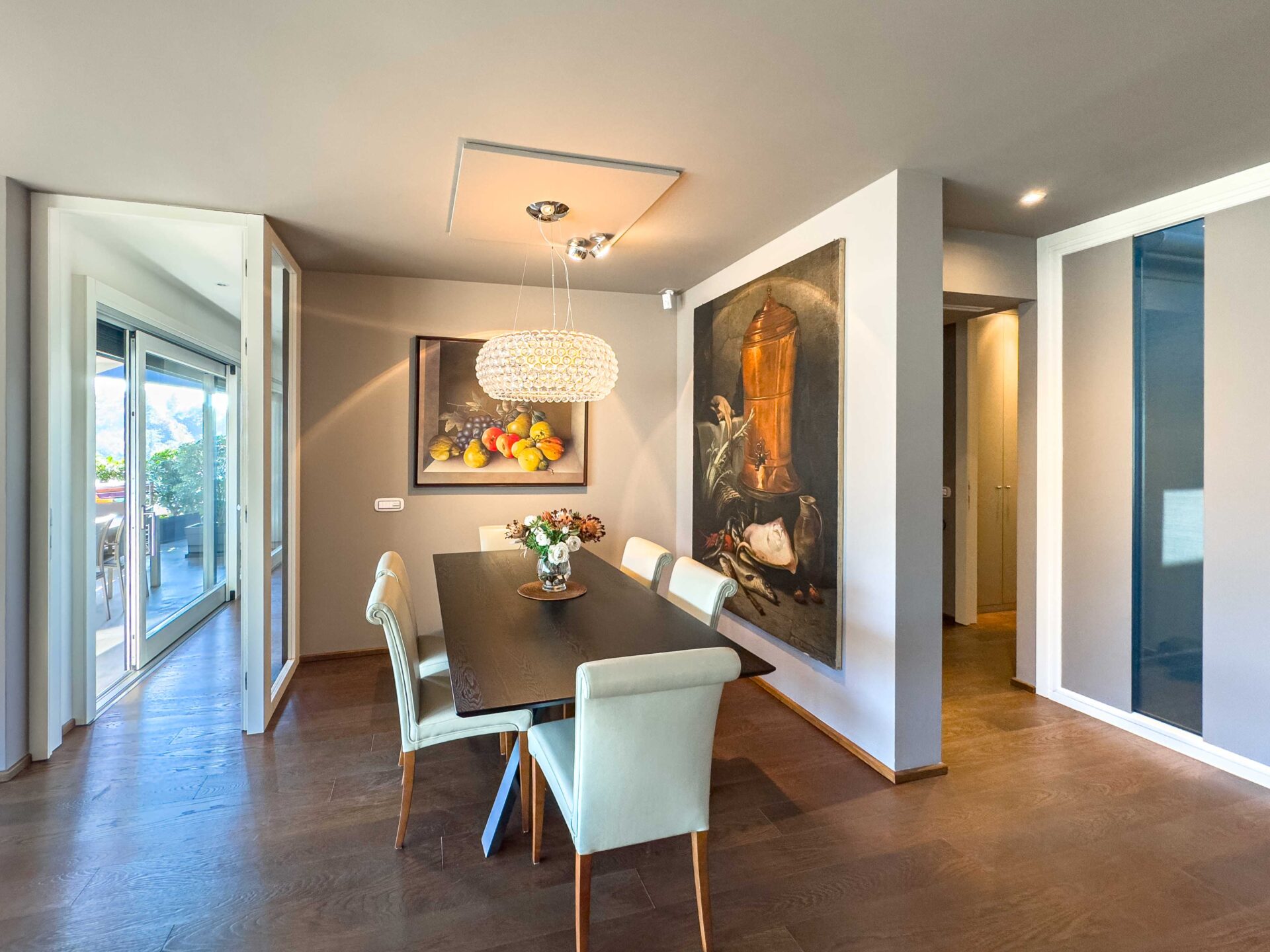 Großes und prestigeträchtiges Penthouse mit Seeblick in Porza zu verkaufen