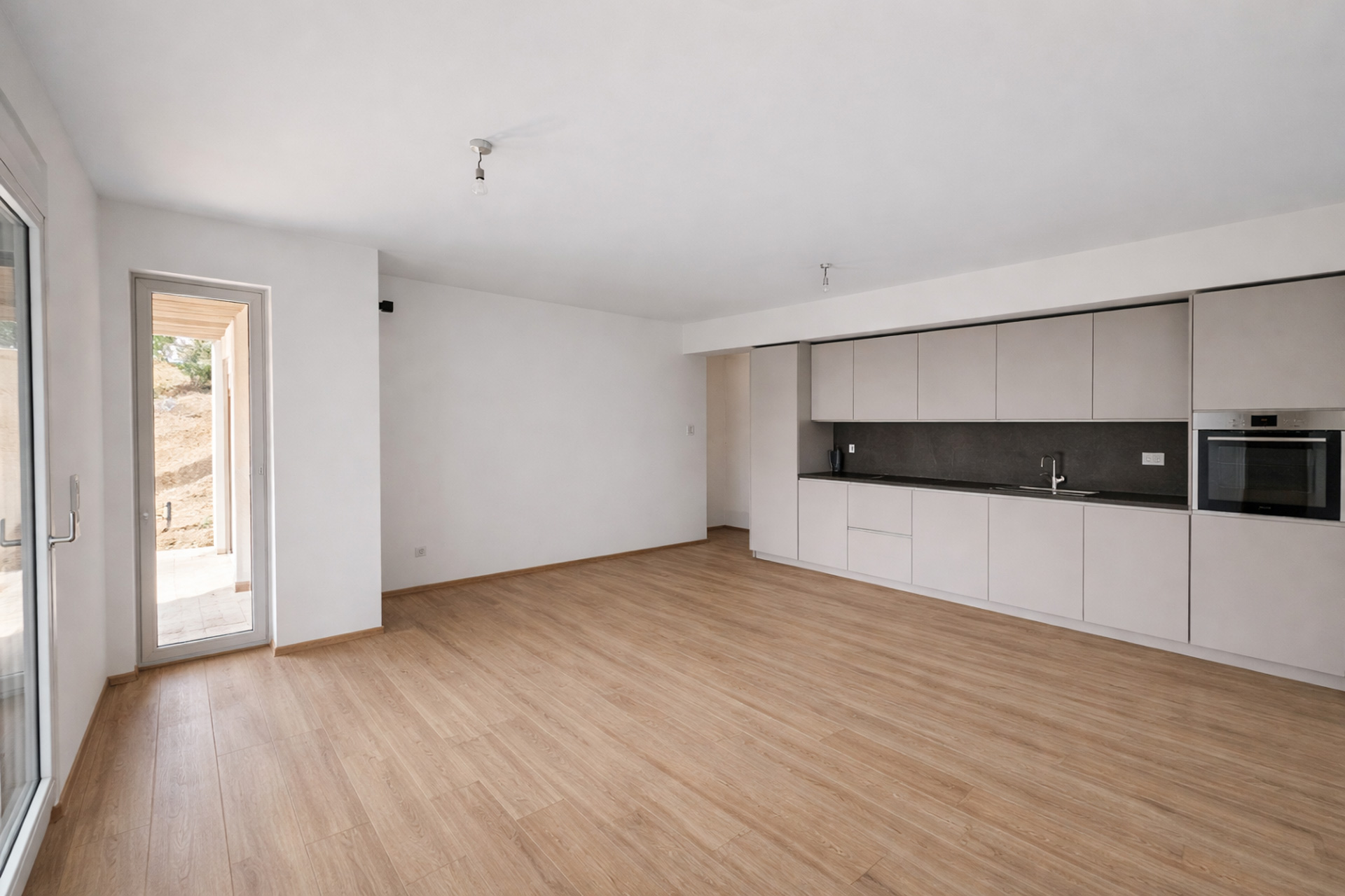 Nuovo appartamento vista lago con giardino in affitto a Massagno