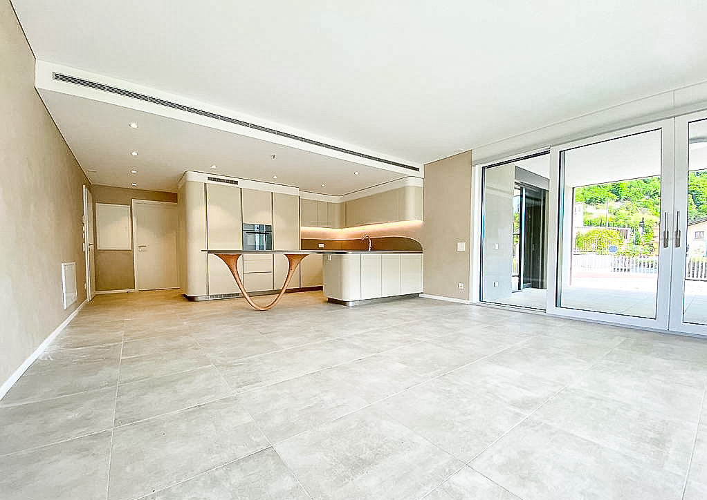 Apartment with garden for sale in Melano a short distance from the lakefront