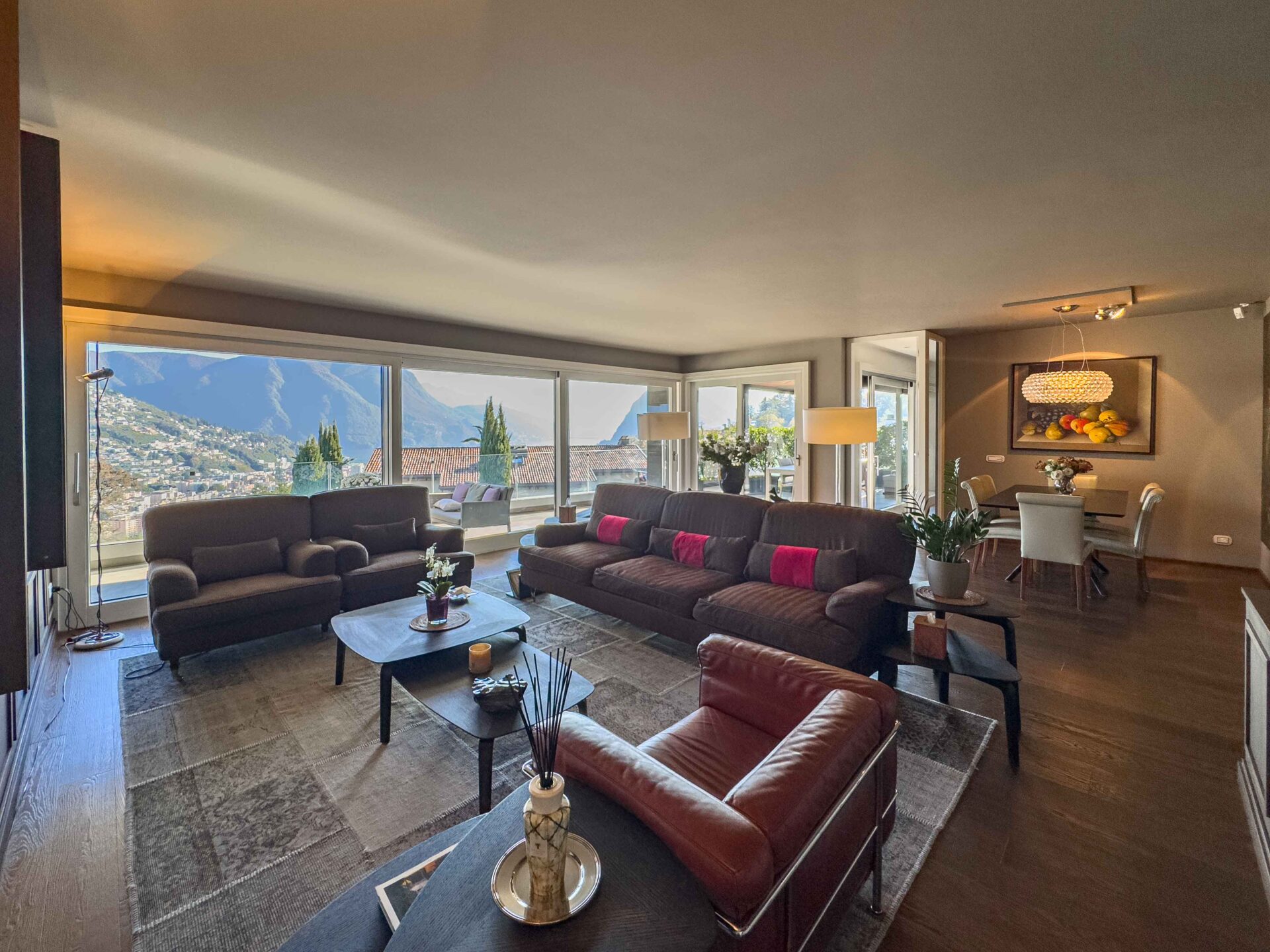 Großes und prestigeträchtiges Penthouse mit Seeblick in Porza zu verkaufen