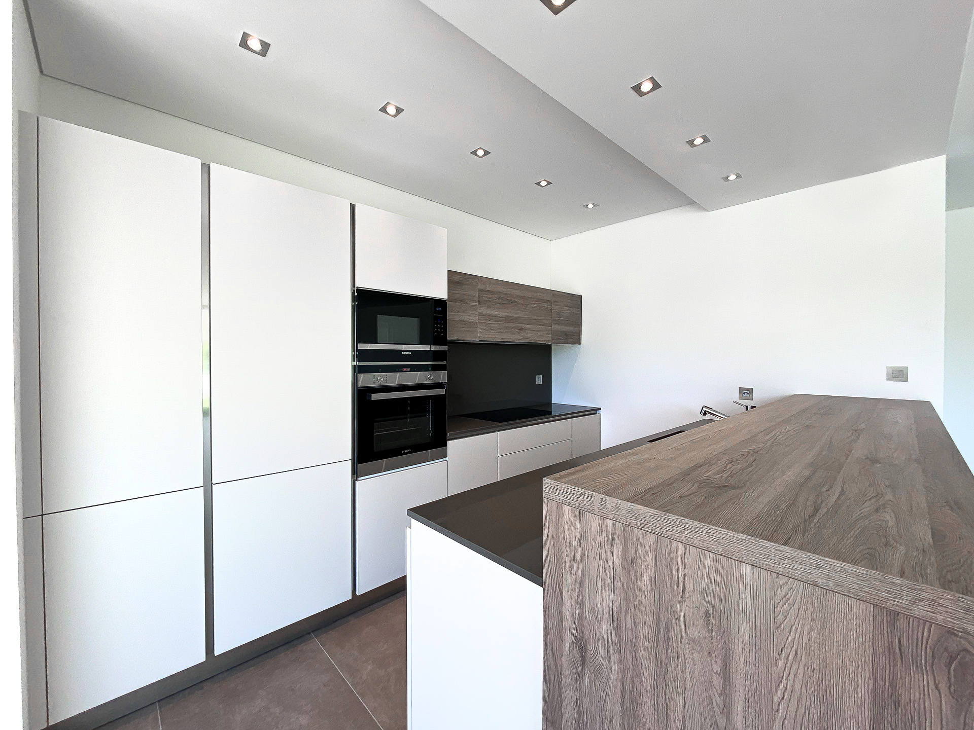 Appartamento 4.5 locali con giardino in vendita a Comano in una nuova elegante e moderna residenza