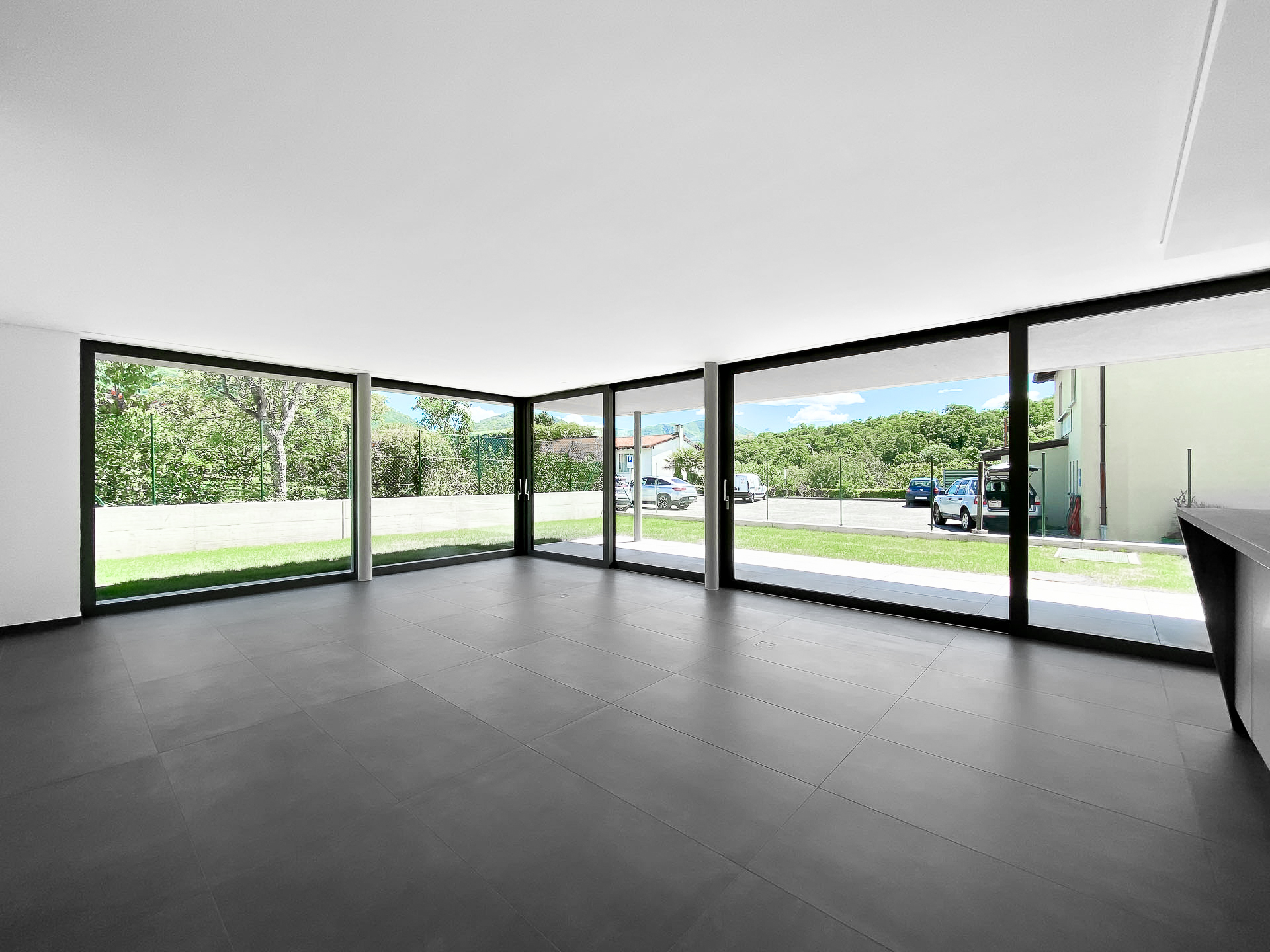 Appartamento 4.5 locali con giardino in vendita a Comano in una nuova elegante e moderna residenza