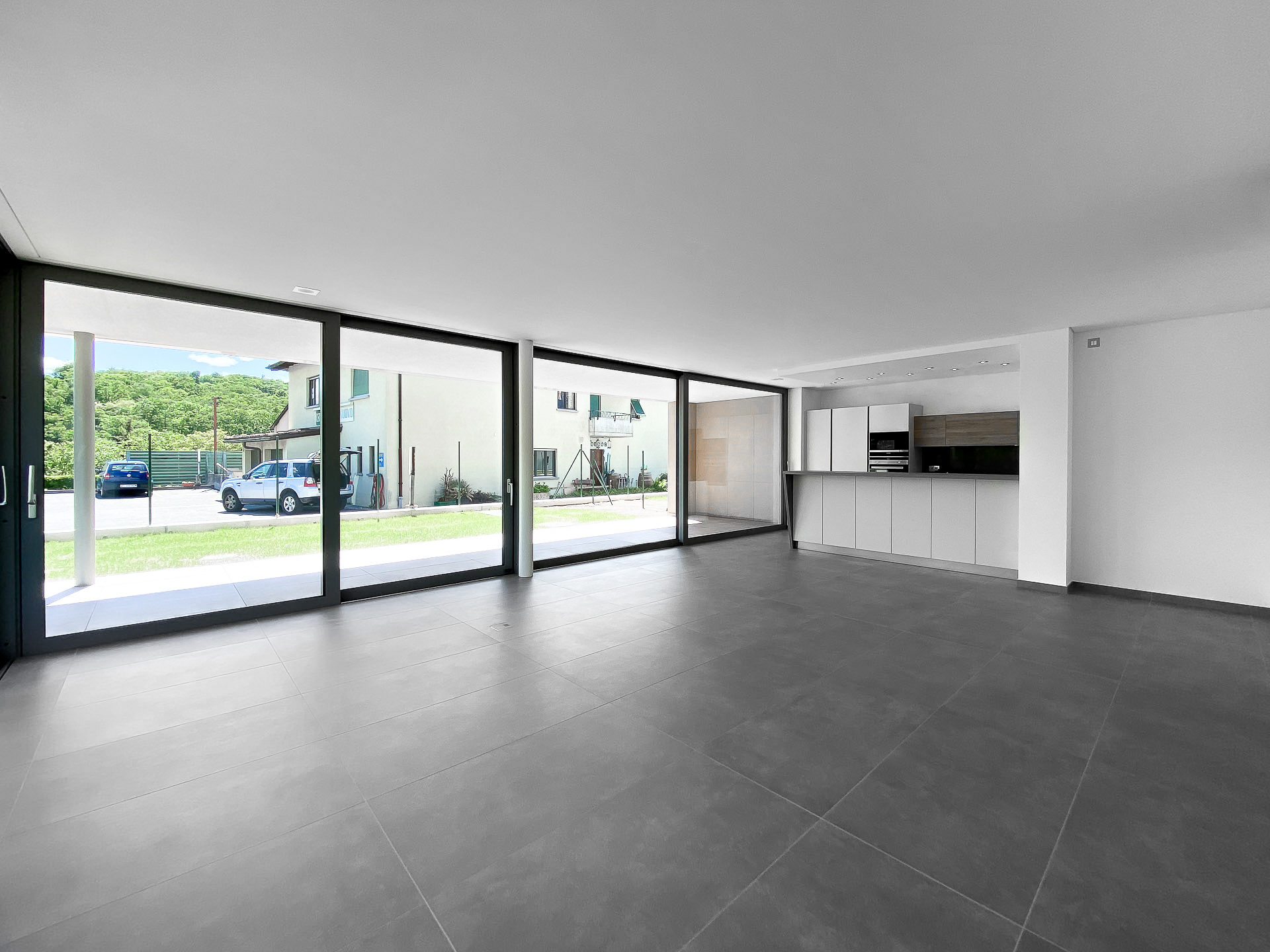 Appartamento 4.5 locali con giardino in vendita a Comano in una nuova elegante e moderna residenza